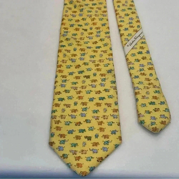 Salvatore Ferragamo luxury yellow silk tie with small whimsical elephant print. - Picture 9 of 11